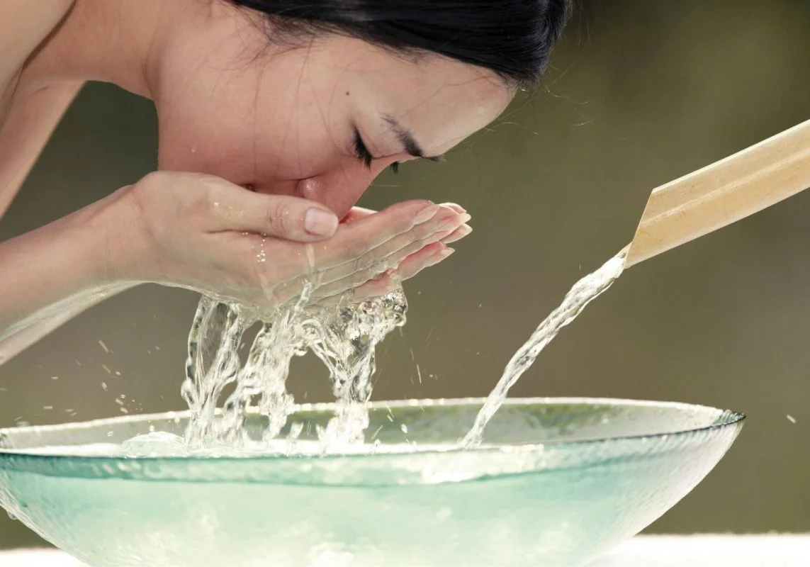 Asian Model Washing Face 